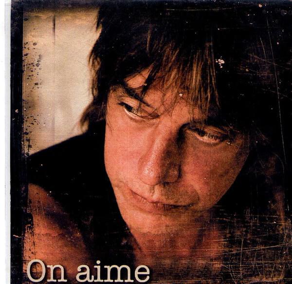 Album cover art for "On Aime" by Jean-Louis Aubert