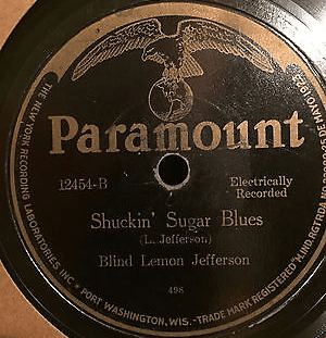 Album cover art for "Shuckin’ Sugar Blues" by Blind Lemon Jefferson