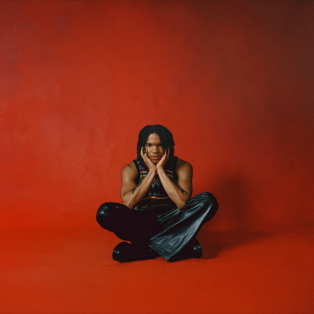 Album cover art for "NOT ALONE" by Q