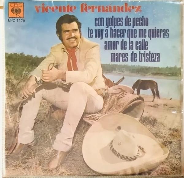 Album cover art for "Con Golpes De Pecho" by Vicente Fernández