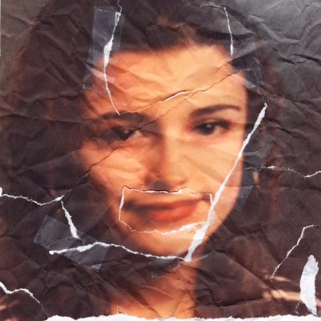Album cover art for "Behind Your Back" by Nelly Furtado