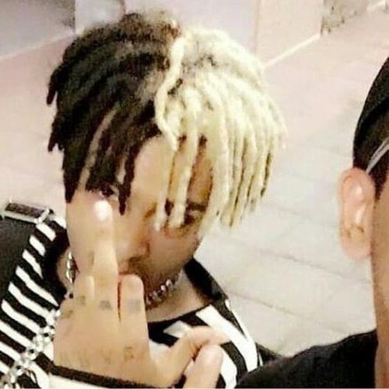 Album cover art for "XXXTENTACION - #ImSippinTeaInYoHood (Traducción al Español)" by Genius Traducciones al Español