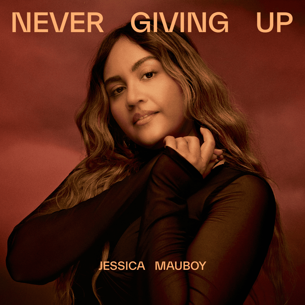 Album cover art for "Never Giving Up" by Jessica Mauboy