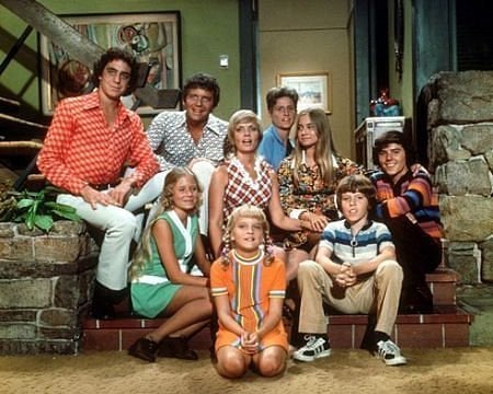 Album cover art for "The Brady Bunch Theme Song" by The Peppermint Trolley Company & The Brady Bunch