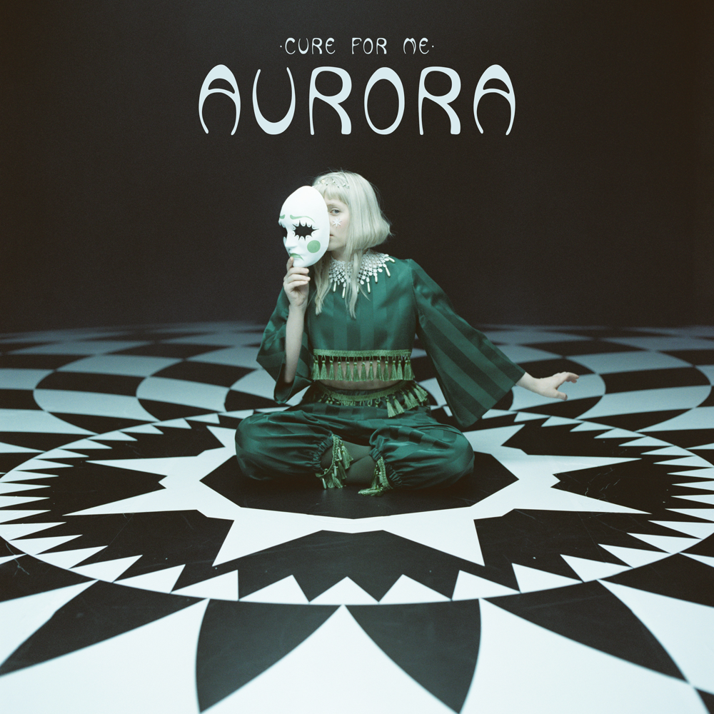 Album cover art for "AURORA - Cure For Me (Traducción al Español)" by Genius Traducciones al Español