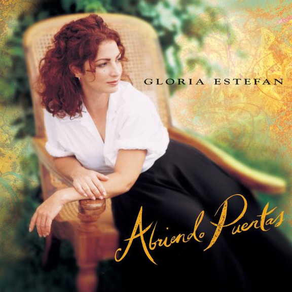 Album cover art for "Abriendo Puertas" by Gloria Estefan