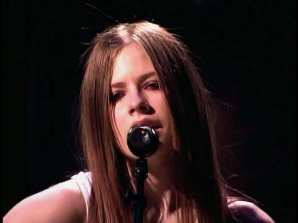 Album cover art for "Avril Lavigne - Tomorrow (Tradução em Português)" by Genius Brasil Traduções