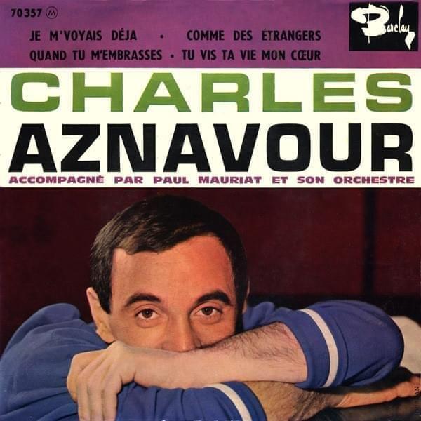 Album cover art for "Quand tu m’embrasses" by Charles Aznavour