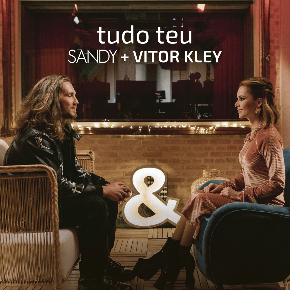 Album cover art for "Tudo Teu" by Sandy & Vitor Kley