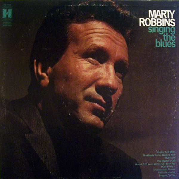 Album cover art for "Singing the Blues" by Marty Robbins