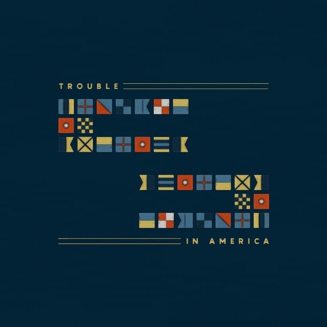 Album cover art for "Trouble in America" by White Lies