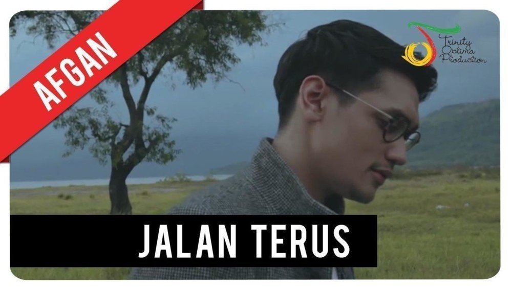 Album cover art for "Jalan Terus" by Afgan