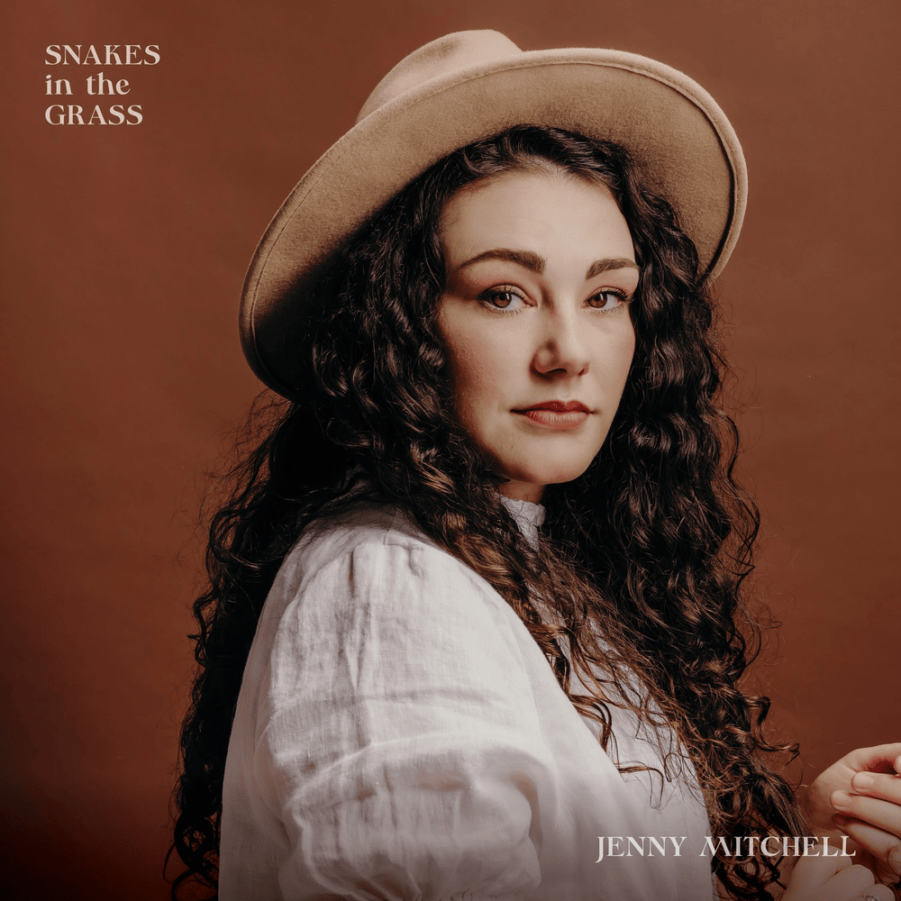 Album cover art for "Snakes In The Grass" by Jenny Mitchell