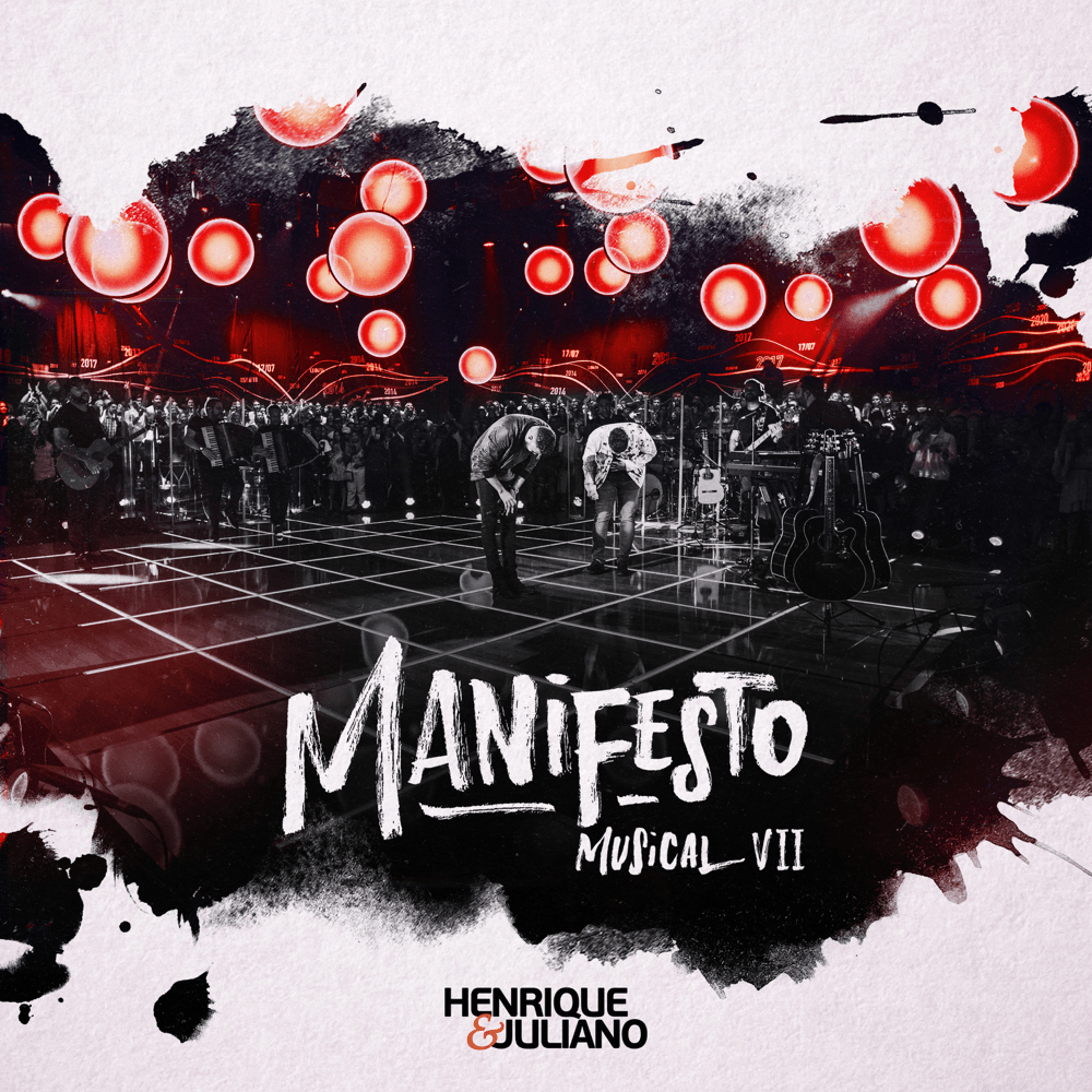 Album cover art for "Troco Na Troca (Ao Vivo)" by Henrique & Juliano