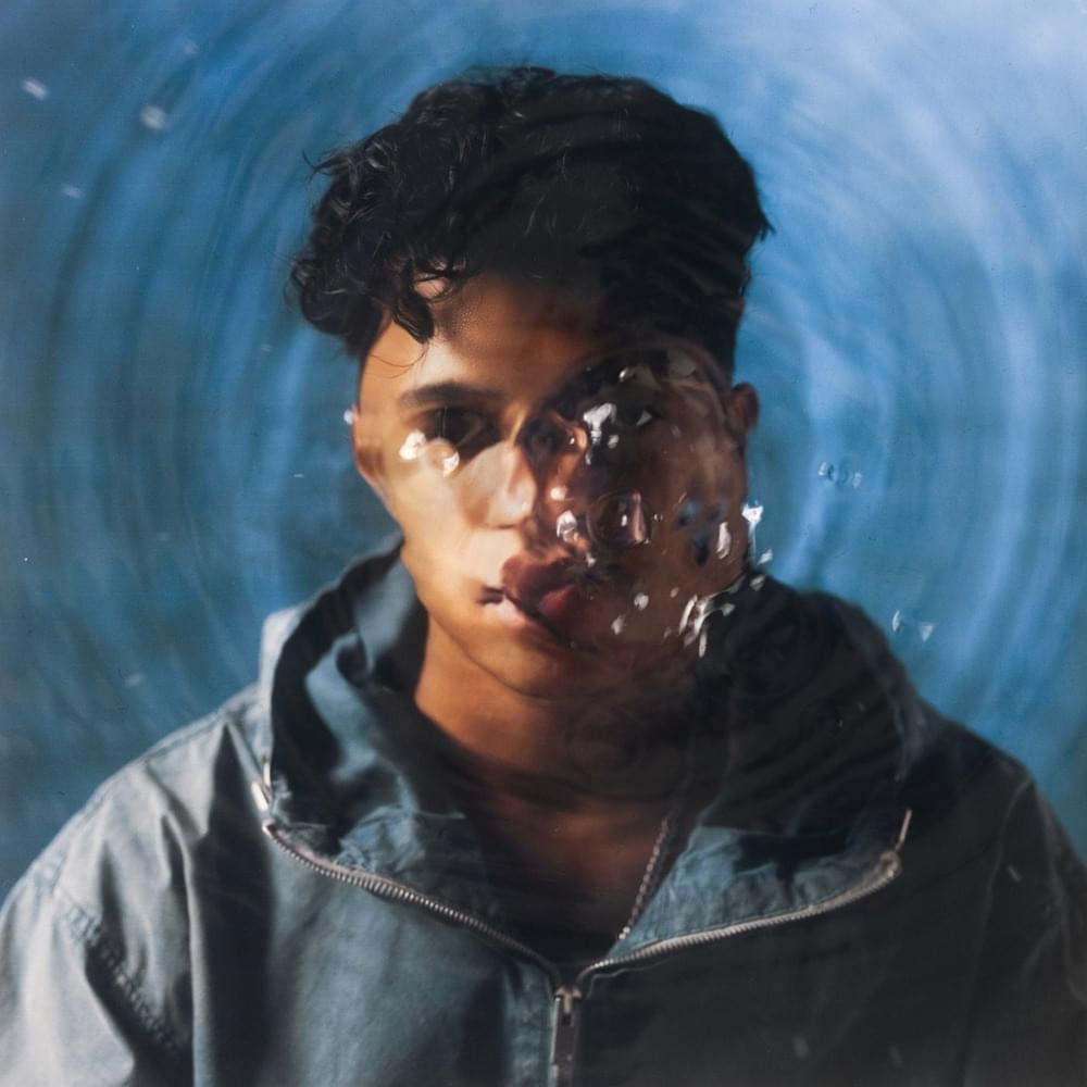 Album cover art for "essential" by Kamal.