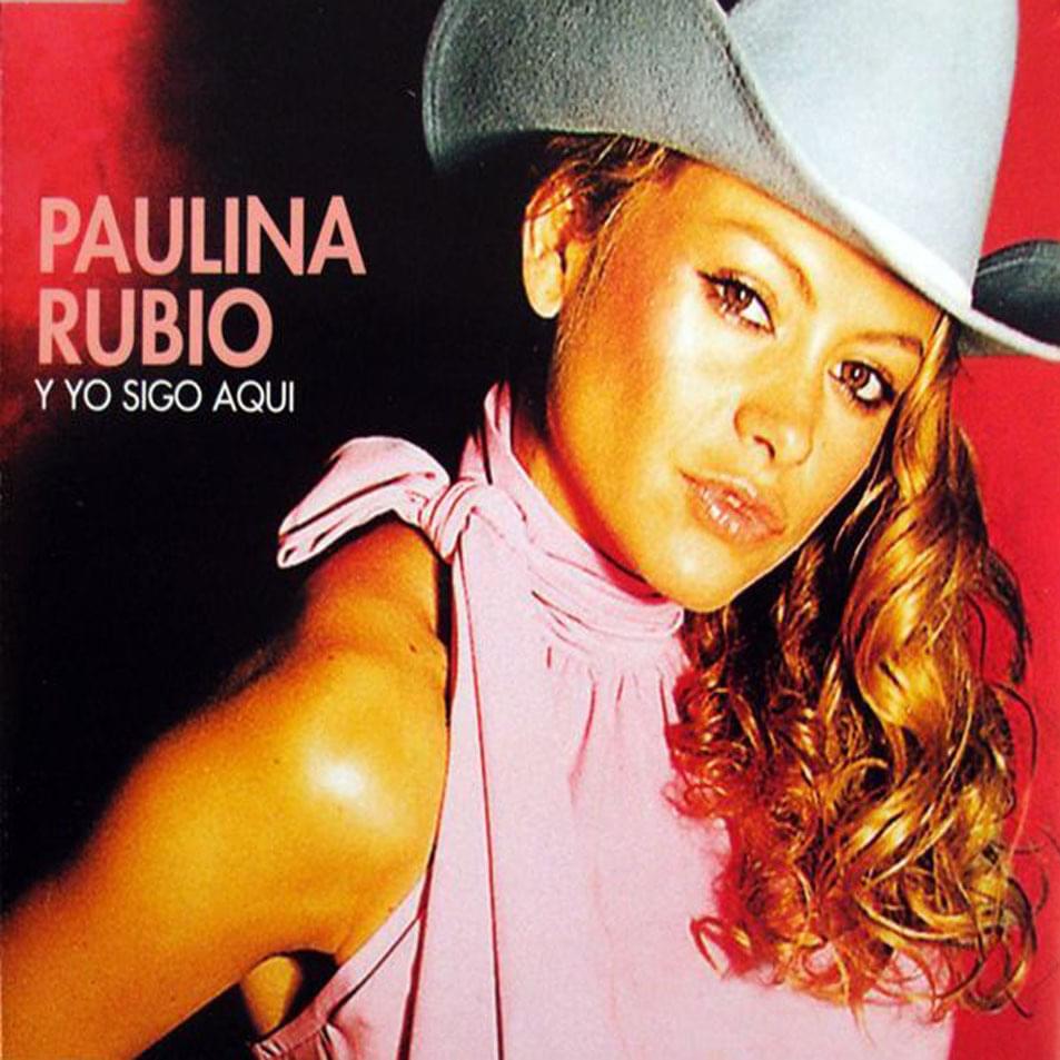 Album cover art for "Y Yo Sigo Aquí" by Paulina Rubio
