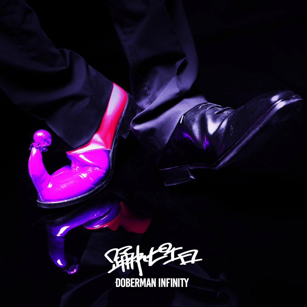 Album cover art for "踊れピエロ (Odore piero)" by DOBERMAN INFINITY