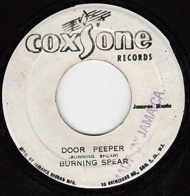 Album cover art for "Door Peep" by Burning Spear
