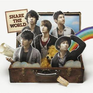Album cover art for "Share The World" by TVXQ! (동방신기)