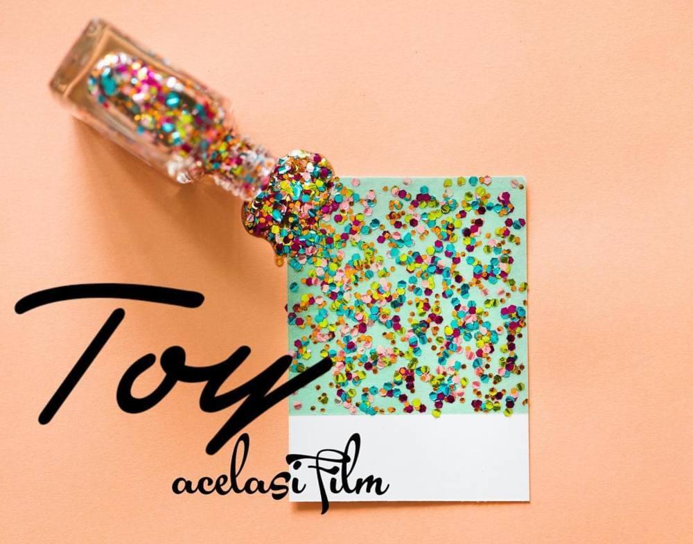 Album cover art for "Același Film" by TOY (RO)