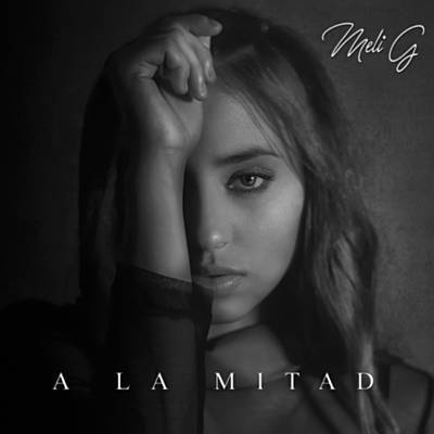 a la mitad by Meli G