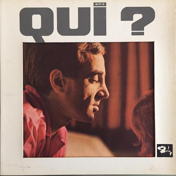 Album cover art for "Qui" by Charles Aznavour