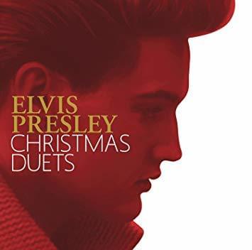 Album cover art for "Silent Night (Duet With Sara Evans)" by Elvis Presley & Sara Evans