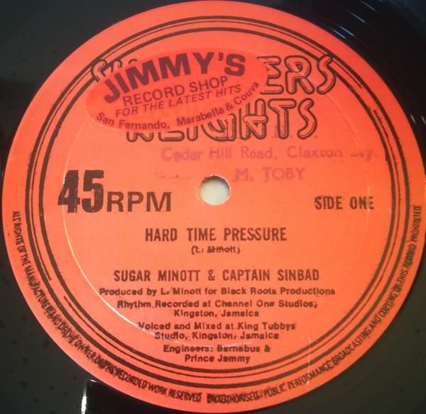 Album cover art for "Hard Time Pressure" by Sugar Minott