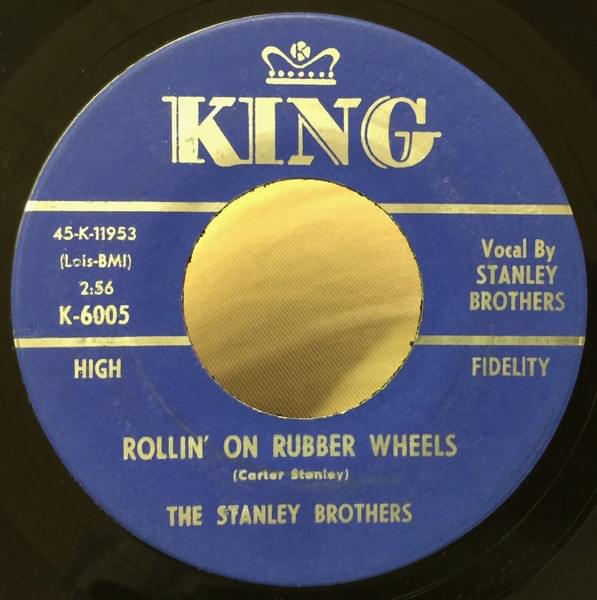 Album cover art for "Rollin’ On Rubber Wheels" by The Stanley Brothers