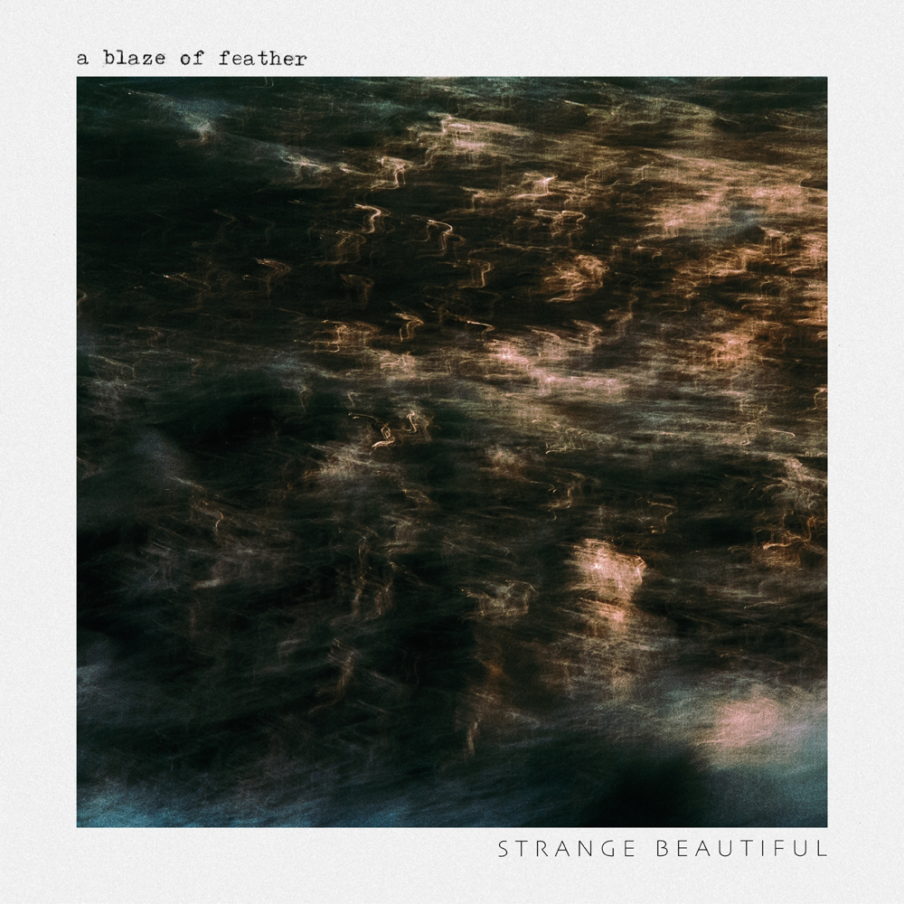 Album cover art for "Strange Beautiful" by A Blaze of Feather