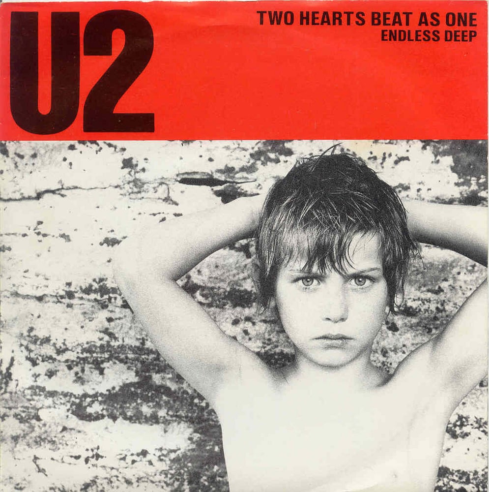 Album cover art for "Two Hearts Beat As One" by U2