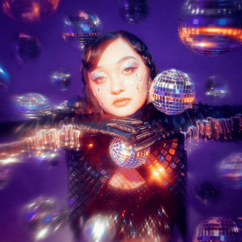 Album cover art for "sad disco" by mxmtoon