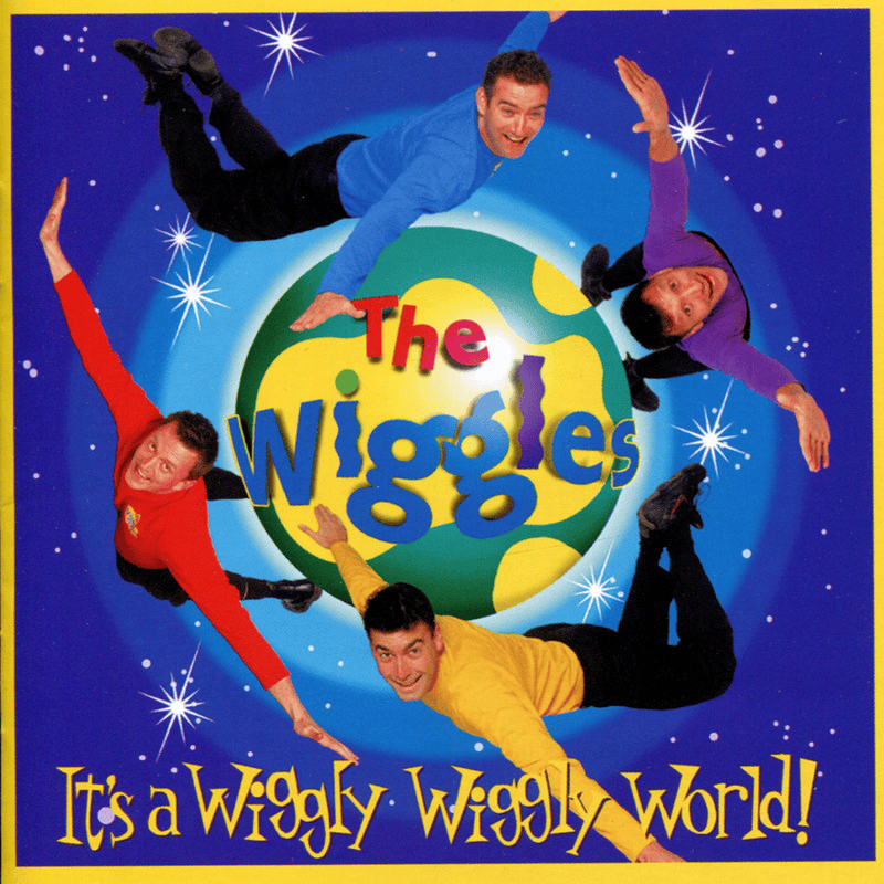 Album cover art for "Six Months in a Leaky Boat (Wiggly Version)" by The Wiggles & Captain Feathersword & Tim Finn
