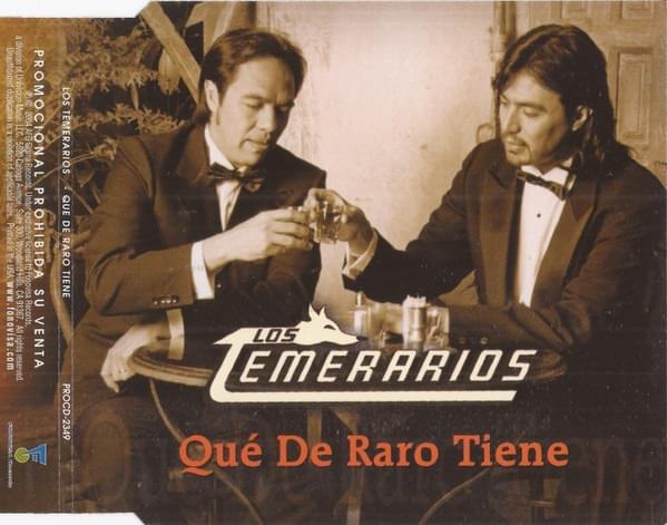 Album cover art for "Que De Raro Tiene (Video Version)" by Los Temerarios
