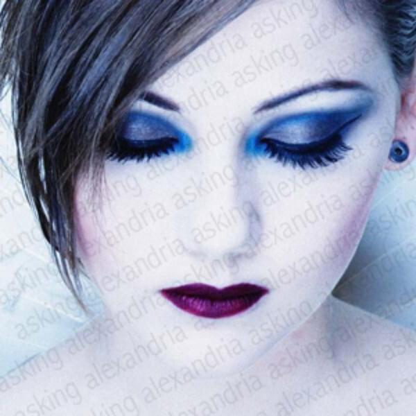 Album cover art for "Bullets in a Music Box" by Asking Alexandria