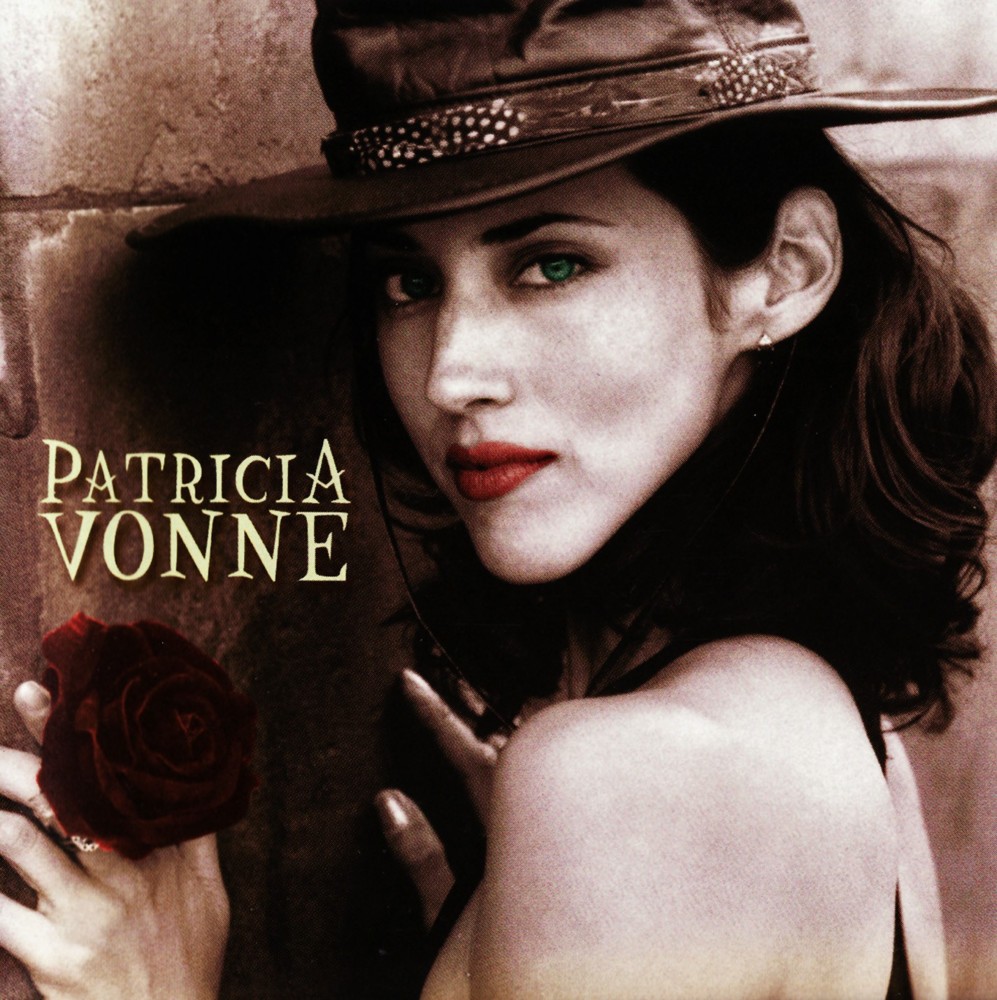 Album cover art for "Traeme Paz" by Patricia Vonne