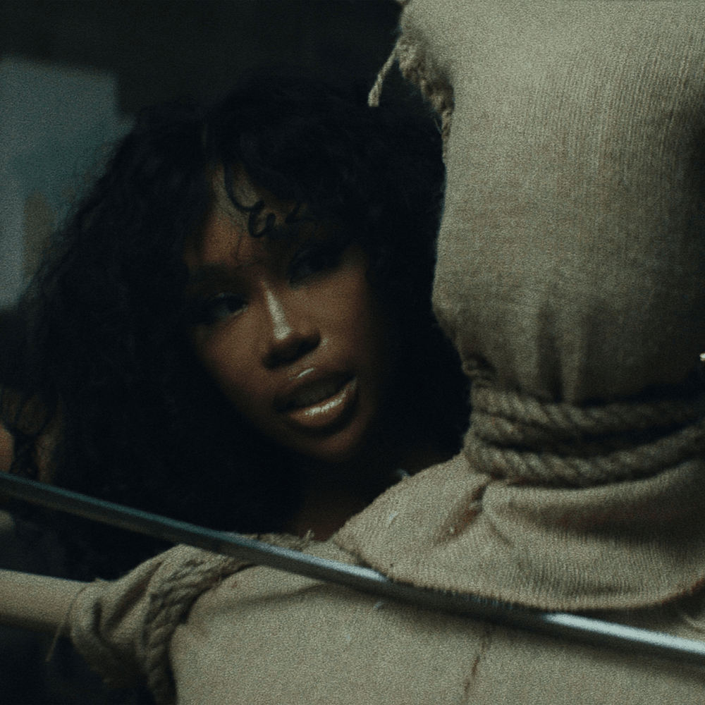 Album cover art for "SZA - Kill Bill (Traducción al Español)" by Genius Traducciones al Español