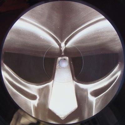 Album cover art for "THE.GREEN.WHORE.NET" by MF DOOM