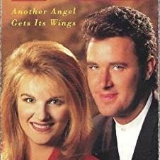 Album cover art for "Another Angel Gets Its Wings" by Trisha Yearwood & Vince Gill