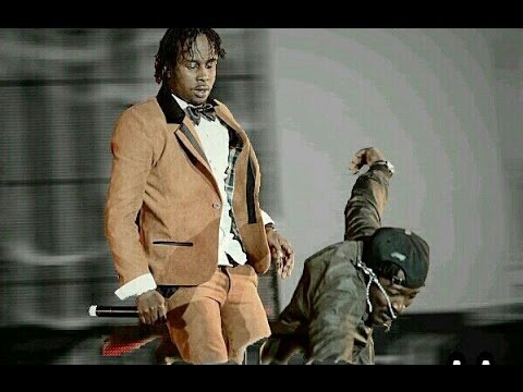 Album cover art for "Dem Sell We Out" by Popcaan