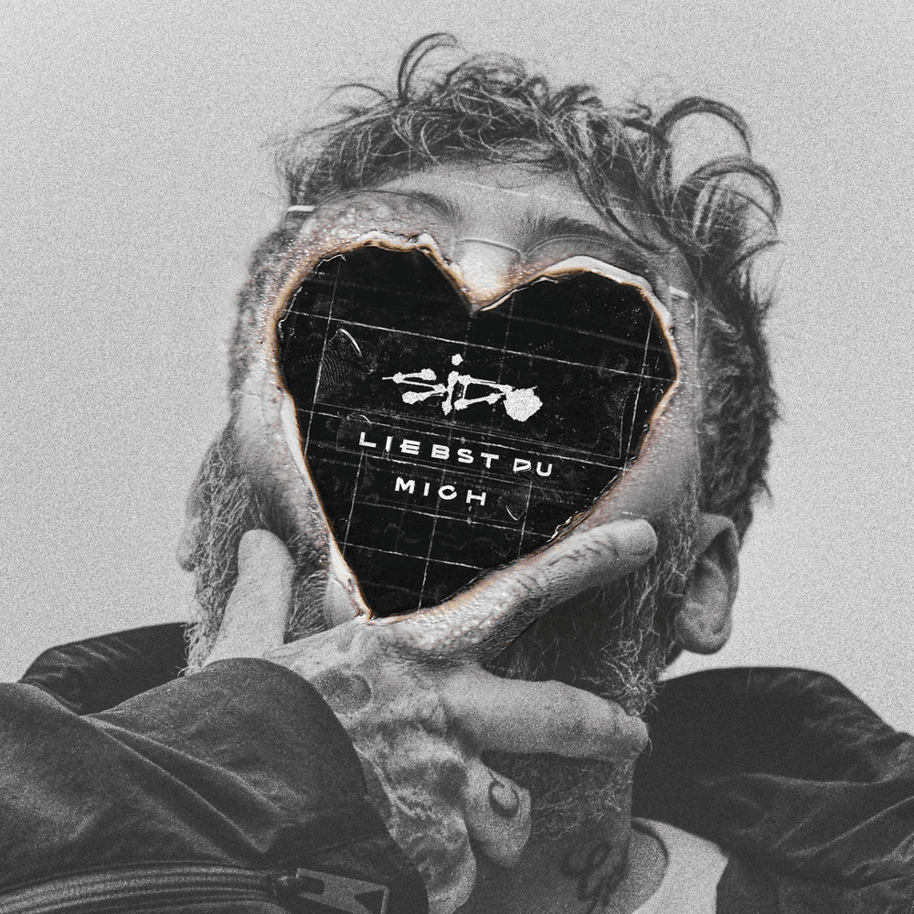 Album cover art for "Liebst du mich" by Sido