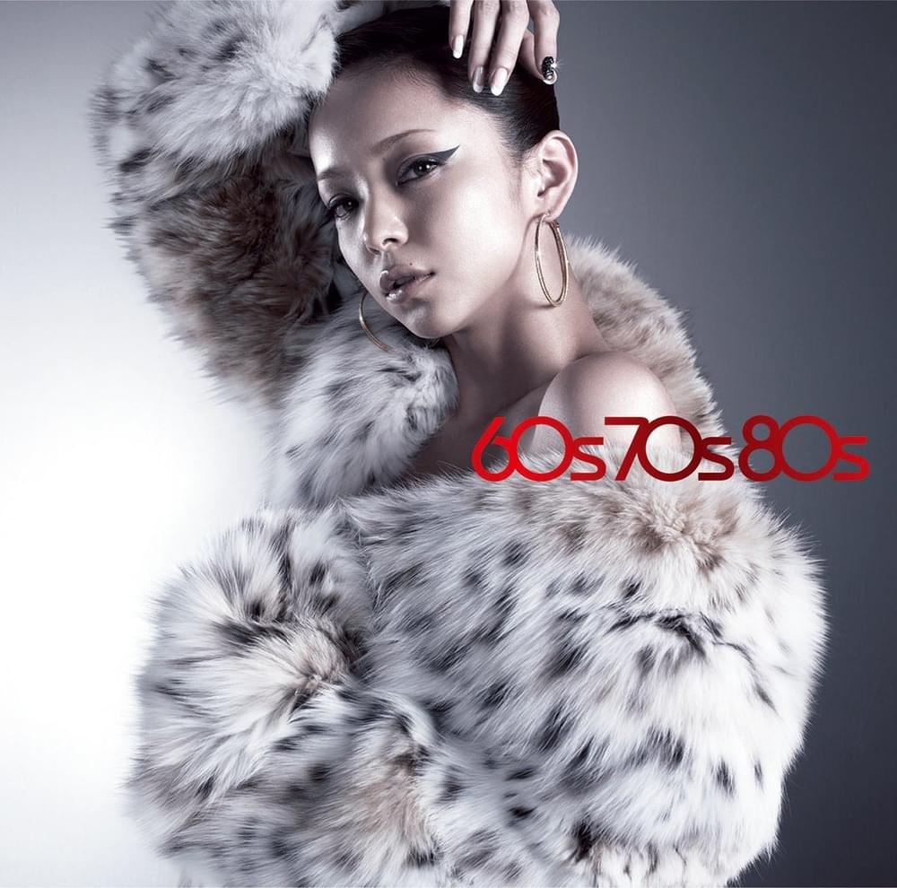 Album cover art for "WHAT A FEELING" by 安室奈美恵 (Namie Amuro)