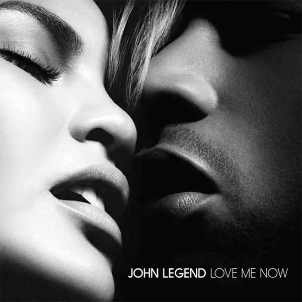 Album cover art for "John Legend - Love Me Now (Tradução em Português)" by Genius Brasil Traduções