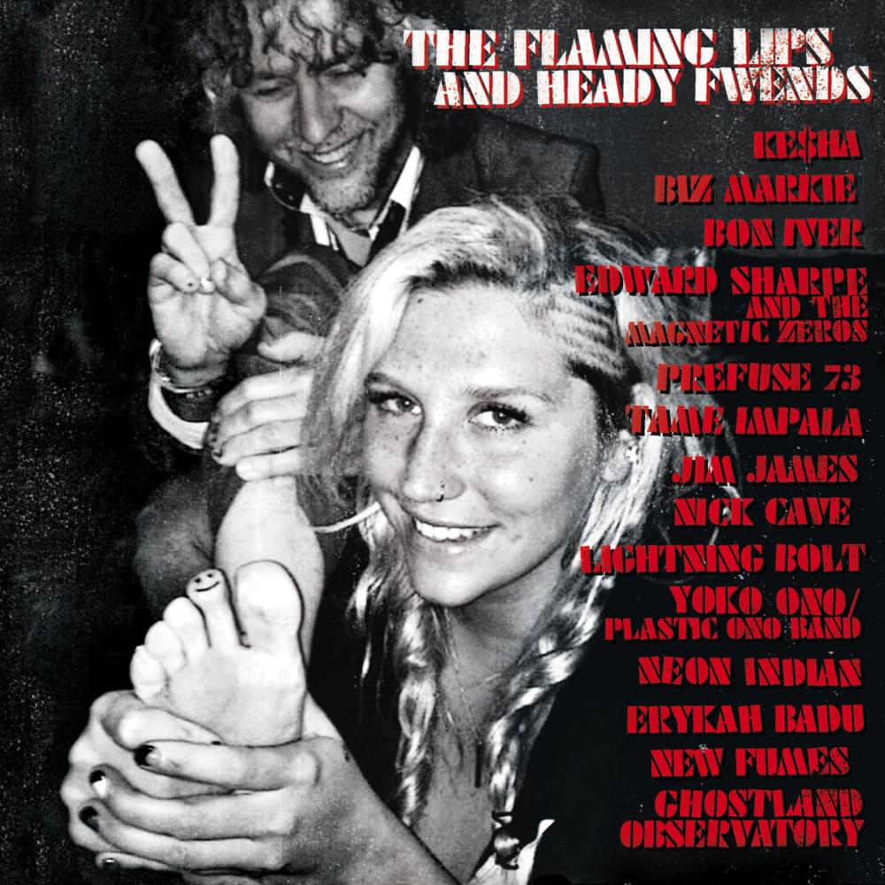 Album cover art for "2012 (You Must Be Upgraded)" by The Flaming Lips & HOTT MT & Kesha & Biz Markie