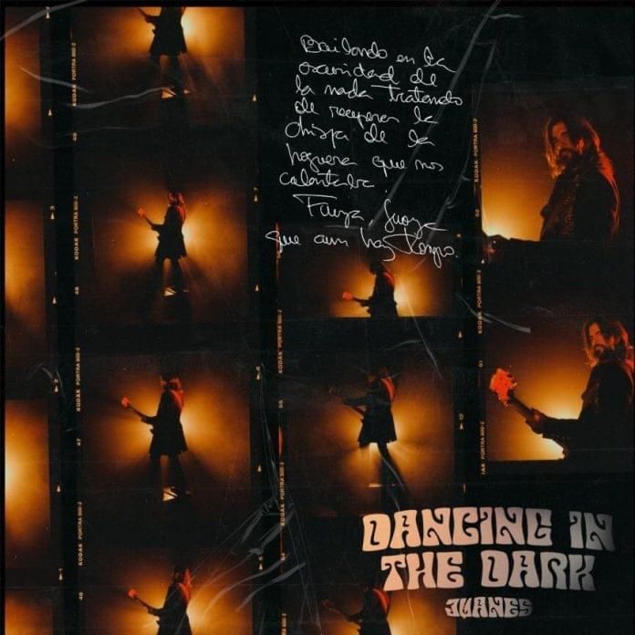 Album cover art for "Dancing In The Dark" by Juanes