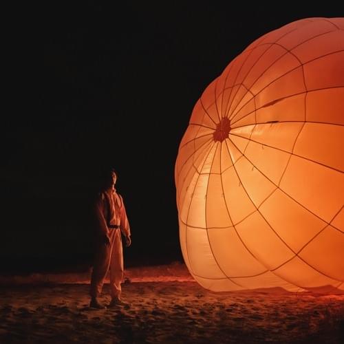 Album cover art for "Drivin Thru The Night (Jai Wolf Remix)" by Petit Biscuit & Jai Wolf
