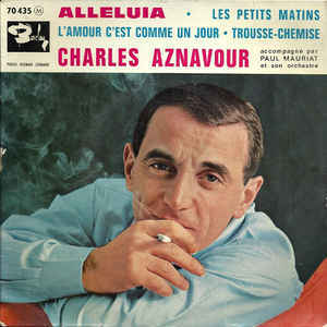 Album cover art for "L’amour c’est comme un jour" by Charles Aznavour