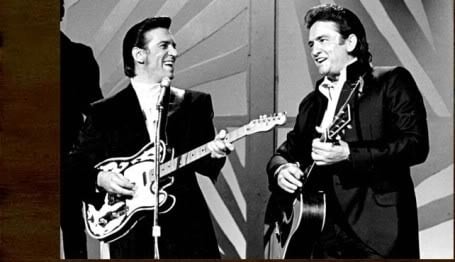 Album cover art for "Brown-Eyed Handsome Man" by Johnny Cash & Carl Perkins