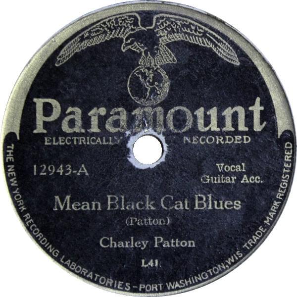 Album cover art for "Mean Black Cat Blues" by Charley Patton