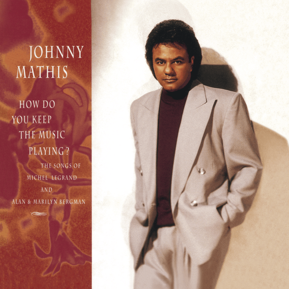Album cover art for "The Windmills of Your Mind" by Johnny Mathis